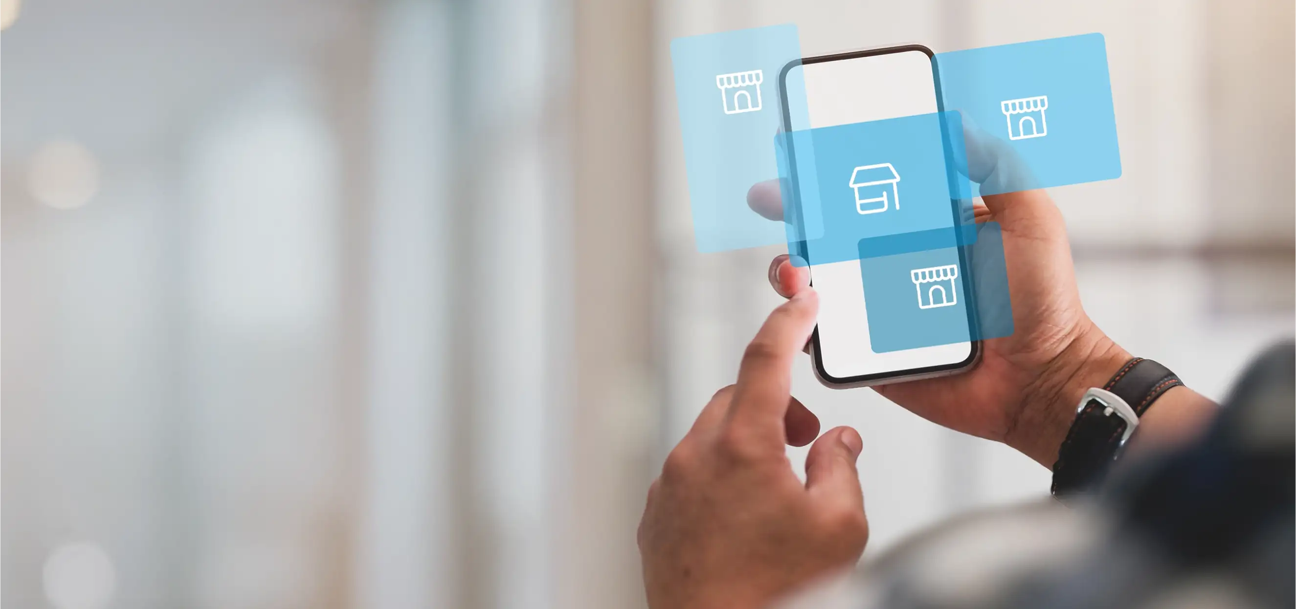 Person nutzt ein Smartphone mit Shop-Symbolen auf dem Display – Darstellung eines Shop-in-Shop-Konzepts in einem Einzelhandelsumfeld